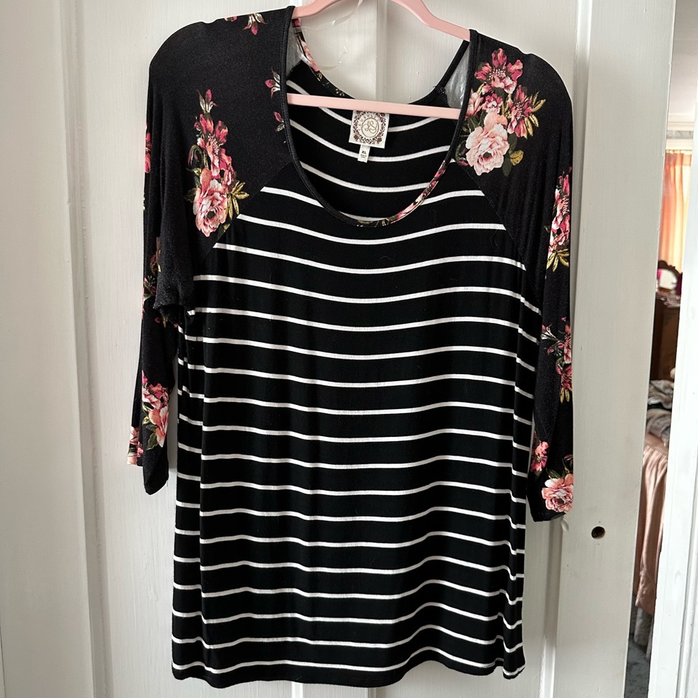 XL baseball style T 3/4 sleeve with mix stripe and floral pattern. True black